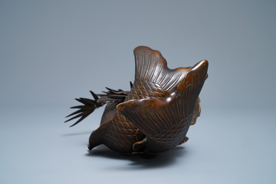 A Japanese bronze group depicting two koi fish, Meiji, 19th C.