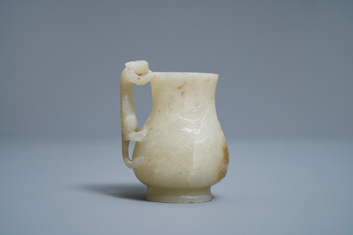 A Chinese celadon russet jade chilong-handled jug, Qing