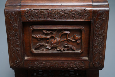 A Chinese finely carved wooden display stand, 19th C.