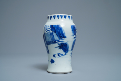 A Chinese blue and white vase with figures in a landscape, Transitional period