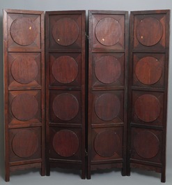 A Chinese wooden room divider with blue and white 'dragon' plaques, 19th C.