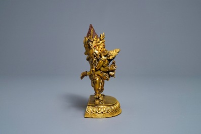 A Sino-Tibetan gilt bronze group of Mahakala and his consort Yab-Yum, 19th C.