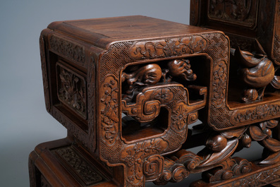 A Chinese finely carved wooden display stand, 19th C.