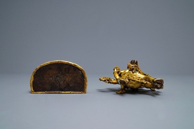 A Sino-Tibetan gilt bronze group of Mahakala and his consort Yab-Yum, 19th C.