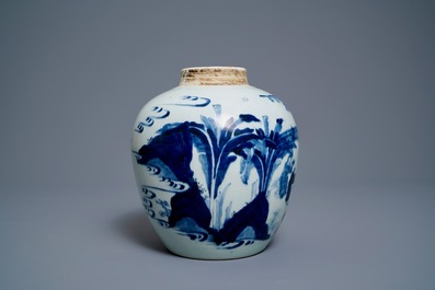 A Chinese blue and white ginger jar with figures in a landscape and a wooden cover, Transitional period