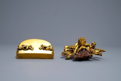 A Sino-Tibetan gilt bronze group of Mahakala and his consort Yab-Yum, 19th C.