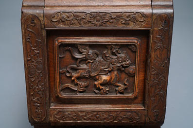 A Chinese finely carved wooden display stand, 19th C.