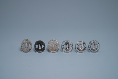 Twenty-five various Japanese bronze and metal tsuba, Meiji, 19th C.