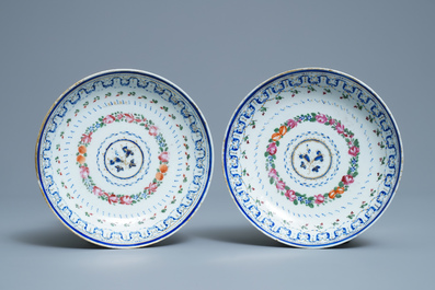 A pair of Chinese famille rose covered bowls on stands, Qianlong