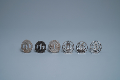 Twenty-five various Japanese bronze and metal tsuba, Meiji, 19th C.