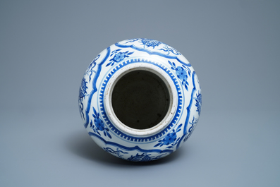 A Chinese blue and white 'dragon' vase with wooden cover and stand, Kangxi
