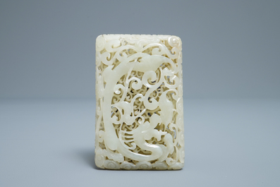 A Chinese reticulated pale celadon jade 'dragon and phoenix' carving, Ming