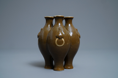 A Chinese conjoined four-part brown-glazed vase, Qianlong mark, 19/20th C.