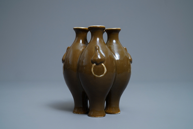 A Chinese conjoined four-part brown-glazed vase, Qianlong mark, 19/20th C.