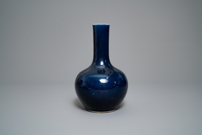A Chinese monochrome 'sacrifical blue' bottle vase, Qianlong mark and of the period