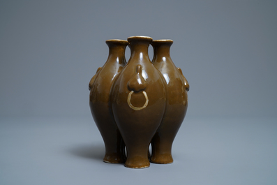 A Chinese conjoined four-part brown-glazed vase, Qianlong mark, 19/20th C.