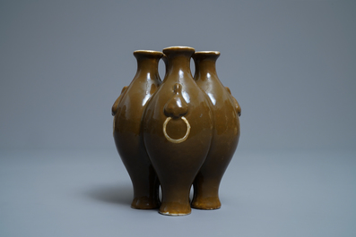 A Chinese conjoined four-part brown-glazed vase, Qianlong mark, 19/20th C.