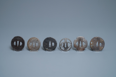 Twenty-five various Japanese bronze and metal tsuba, Meiji, 19th C.