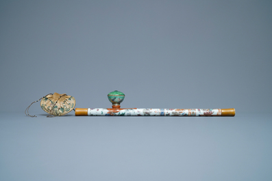 A Chinese famille rose opium pipe with silk pouch, 19th C.