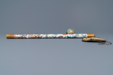 A Chinese famille rose opium pipe with silk pouch, 19th C.