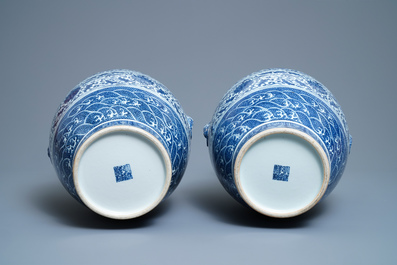 A pair of Chinese blue and white hu vases with floral scrolls, Qianlong mark, 19th C.