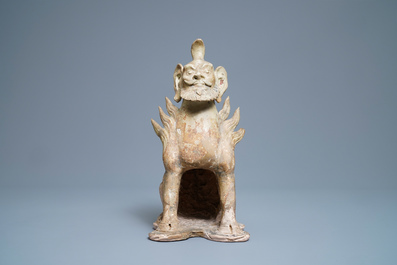 A Chinese straw-glazed stoneware 'earth spirit', Sui (581-617)