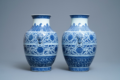 A pair of Chinese blue and white hu vases with floral scrolls, Qianlong mark, 19th C.