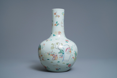 A Chinese famille rose vase with figurative medallions, Qianlong mark, 19th C.