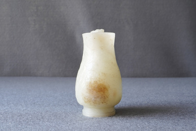 A Chinese celadon russet jade chilong-handled jug, Qing