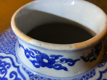 A Chinese blue and white 'lotus scroll' jar, dated 1587, Wanli mark and of the period