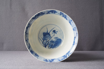 A fine Chinese blue and white 'Herons by a lotus pond' bowl, Fu mark, Kangxi