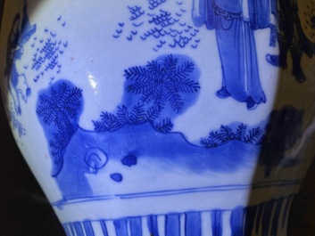 A Chinese blue and white baluster vase with figures in a landscape, Transitional period