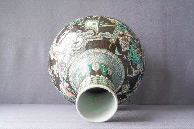 A Chinese famille verte black-ground 'war scene' vase, 19th C.