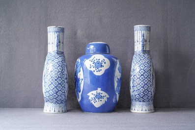 A pair of Chinese blue and white 'moonflask' vases and a covered jar, 19th C.