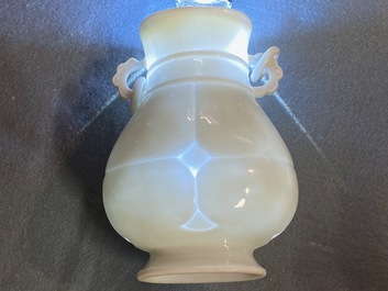 Un vase de forme hu en porcelaine blanc de Chine translucide, marque et &eacute;poque de Yongzheng