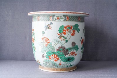 A large Chinese famille verte jardini&egrave;re and a rouleau vase, 19th C.