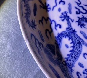 A pair of Chinese blue and white 'dragon' dishes, Kangxi mark, Guangxu