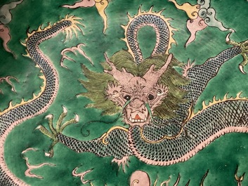 A Chinese verte biscuit 'dragon' charger, Kangxi mark, 19th C.