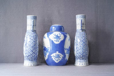 A pair of Chinese blue and white 'moonflask' vases and a covered jar, 19th C.