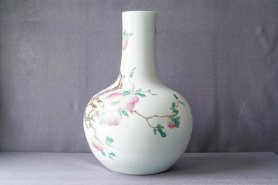 A Chinese famille rose 'peaches' vase, Qianlong mark, 19th C.