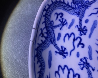 A pair of Chinese blue and white 'dragon' dishes, Kangxi mark, Guangxu