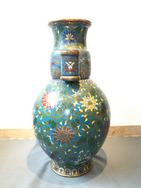 Een grote Chinese cloisonn&eacute; hu vaas met lotusslingers, gemerkt Qi Yu Bao Tung Chih Chen, 19e eeuw