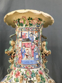 A pair of large Chinese famille rose court scene vases, 19th C.