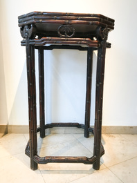 A Chinese huali wooden stand with famille rose plaque, Jiaqing