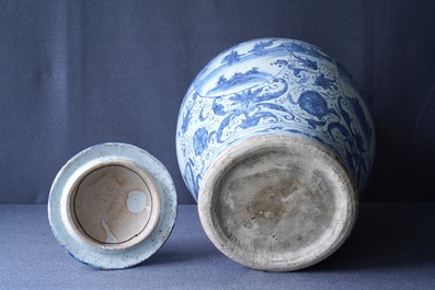 A Chinese blue and white vase and cover with figural design, Wanli