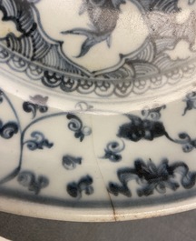 Two Chinese blue and white dishes with a peacock and with fish, Hongzhi