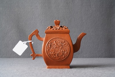 A Chinese Yixing stoneware teapot and cover, Jingxi Hua Feng Xiang Zhi mark, 18/19th C.