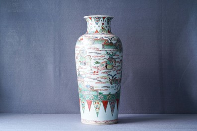 A Chinese famille verte vase with warriors on horseback, Kangxi
