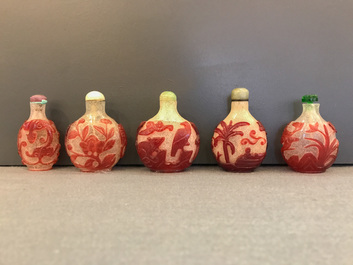 Five Chinese red overlay snowflake glass snuff bottles, 18/20th C.