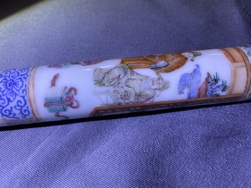 A Chinese famille rose opium pipe with silk pouch, 19th C.